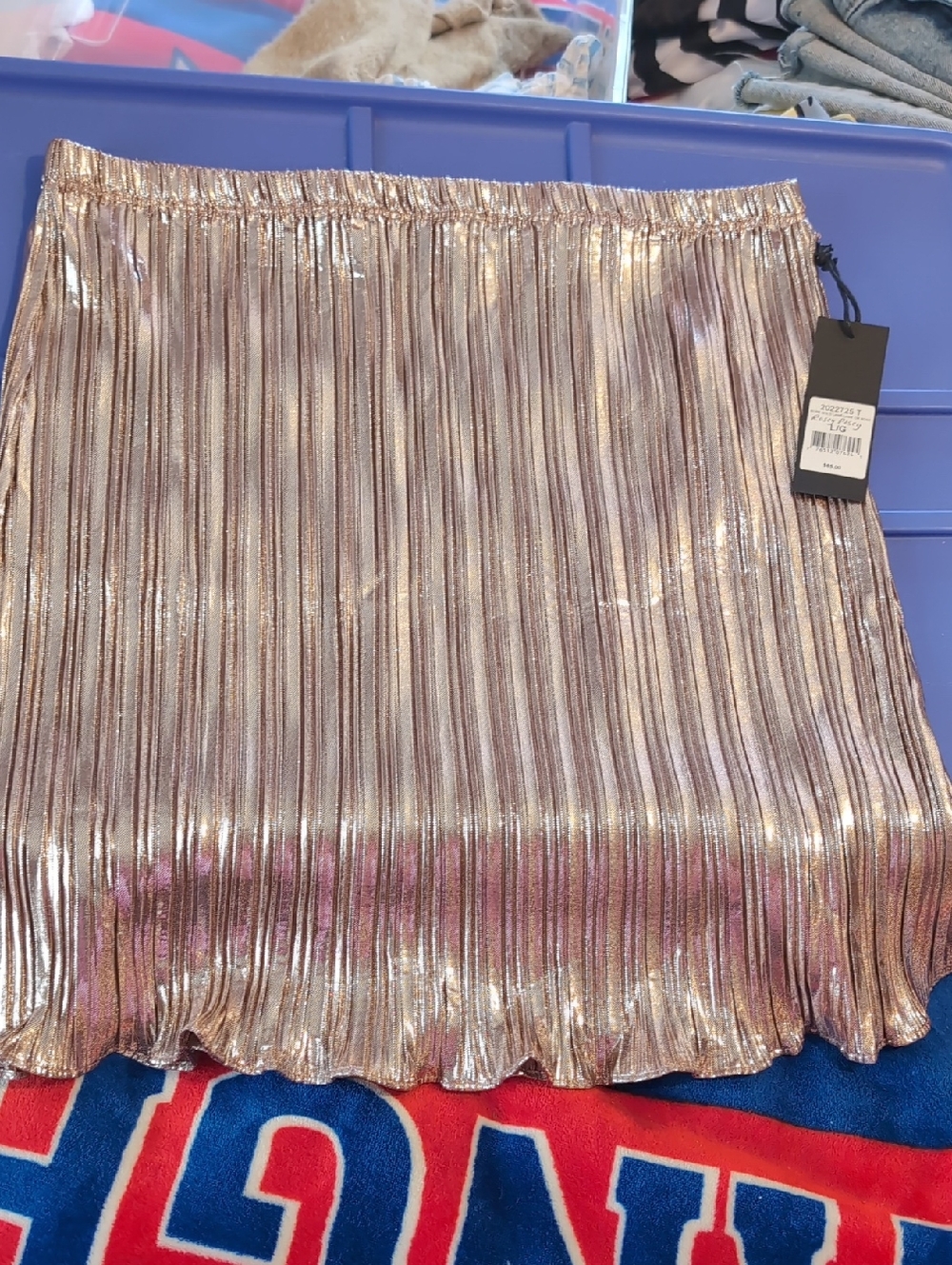 Black Tape_ Metallic Pleated Mini Skirt in Rose Gold